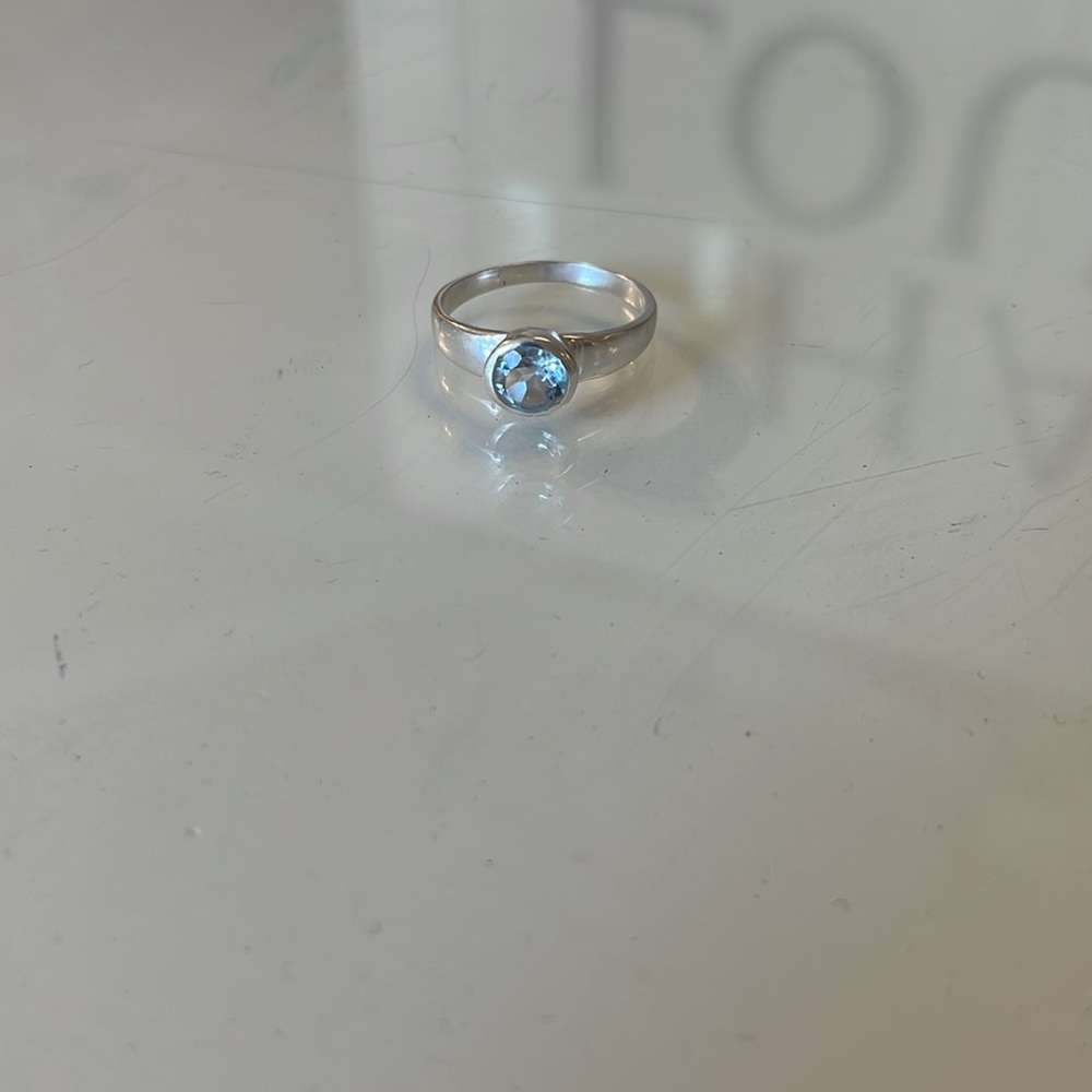 Blue topaz gemstone ring in size 7